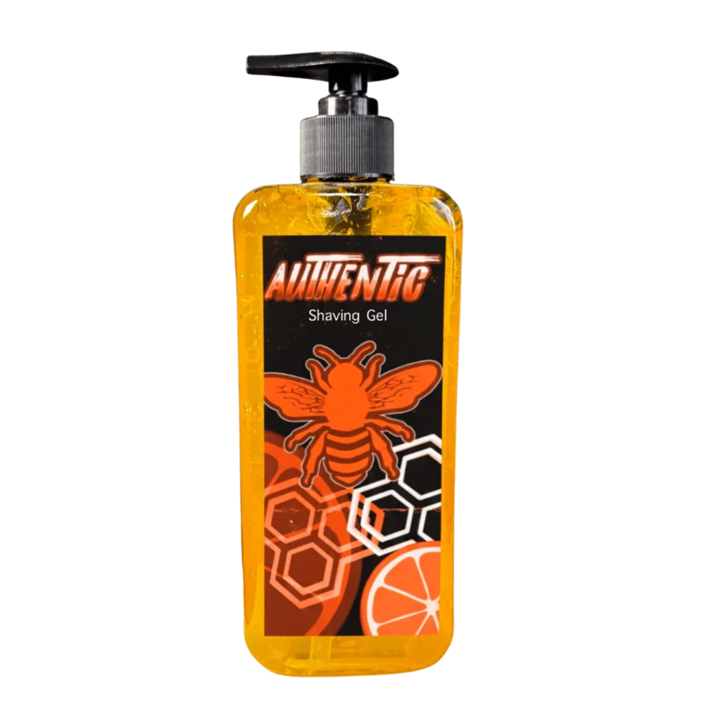 Shaving Gel Authentic Vision Imperial de 500ml en botella cilíndrica transparente con gel naranja y dispensador de bomba negro.