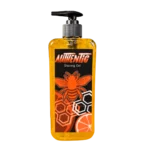 Shaving Gel Authentic Vision Imperial de 500ml en botella cilíndrica transparente con gel naranja y dispensador de bomba negro.