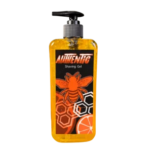 Shaving Gel Authentic Vision Imperial de 500ml en botella cilíndrica transparente con gel naranja y dispensador de bomba negro.