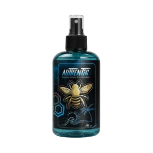 Locion facial y corporal Aureus Blue de Authentic en envase de 245 ml con atomizador negro y etiqueta con abeja dorada sobre fondo negro.